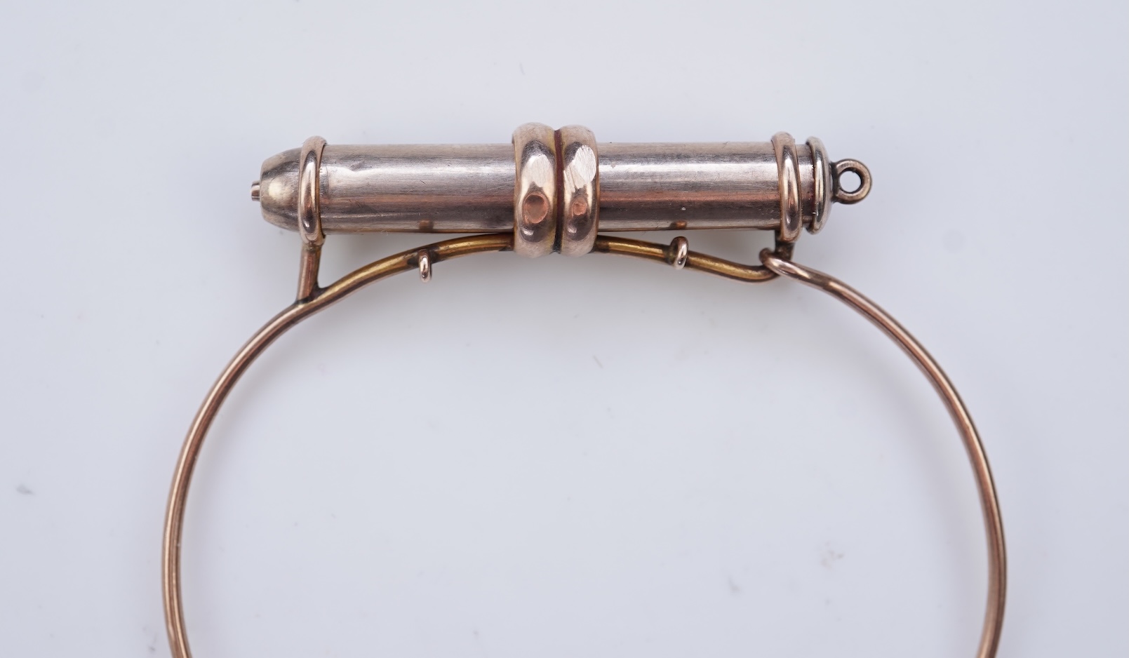 A gold bracelet and propelling pencil, first half 20th century